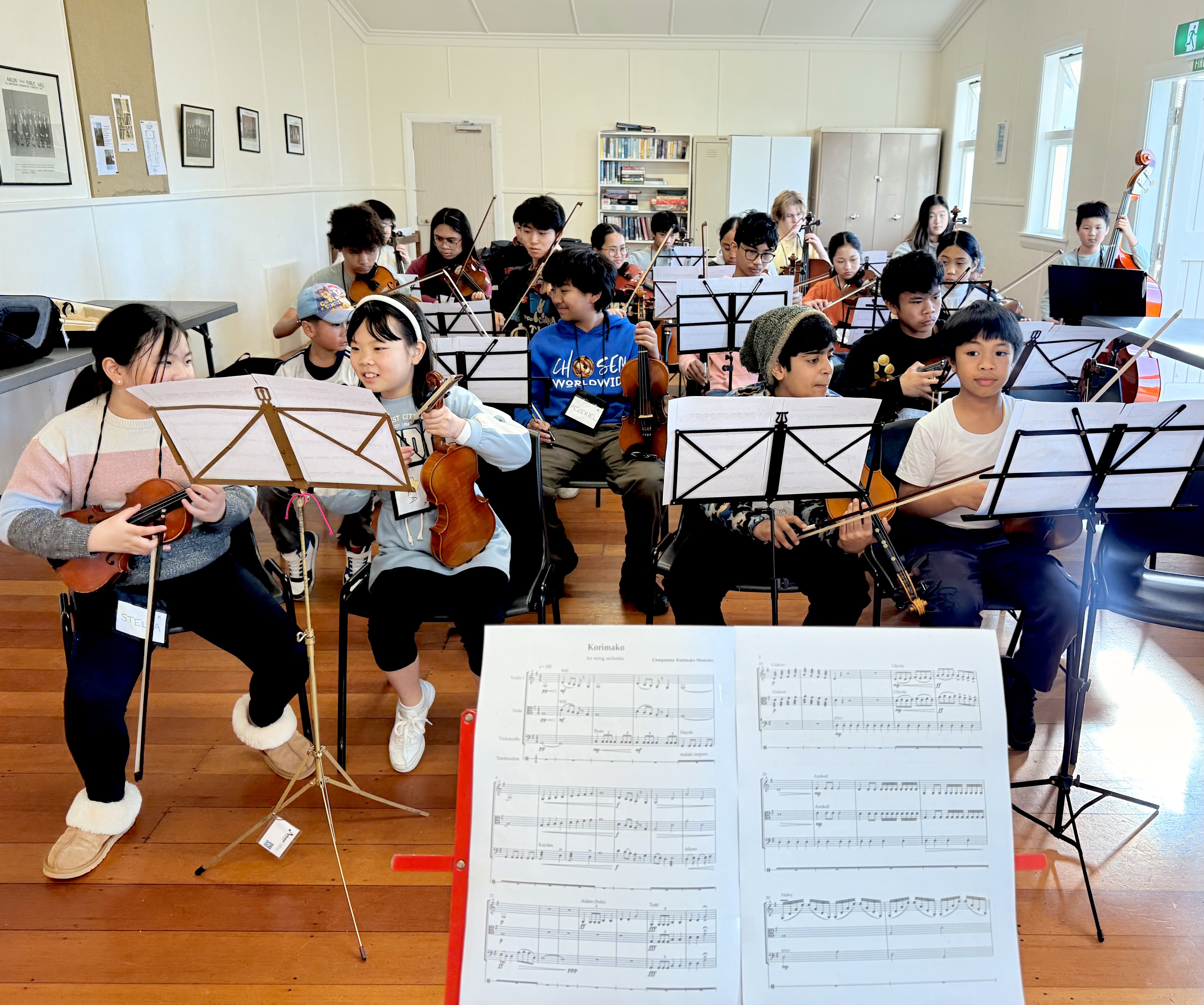 Young orchestra rehearsing in the dining room at Avalon